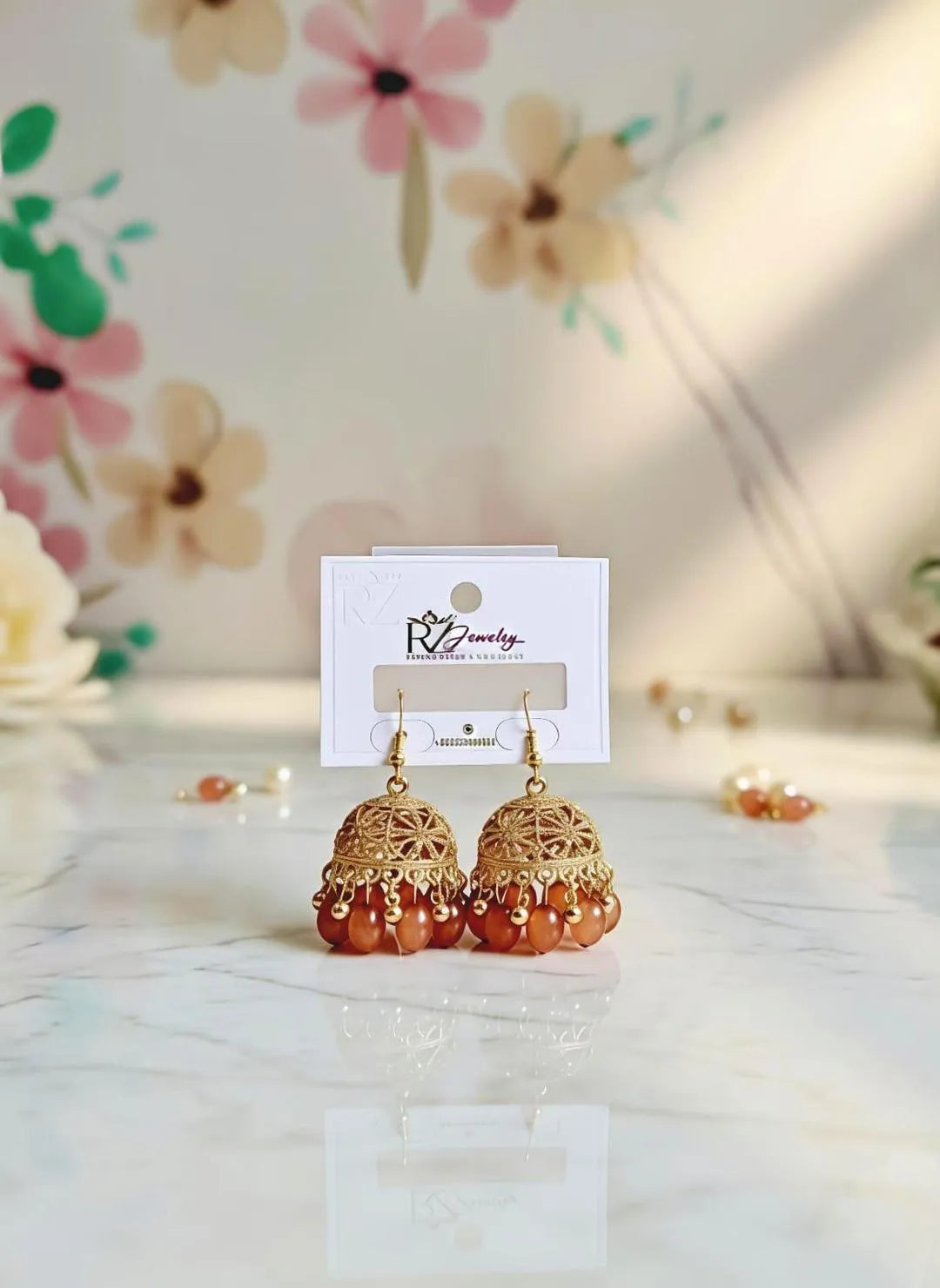 Elegant Gold Plated Jhumkas with Amber Beads for Weddings