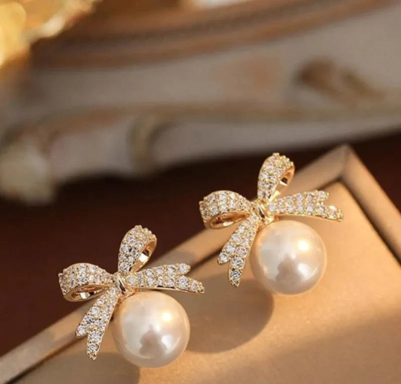 Gold Plated Bow Earrings with Pearl & Sparkle